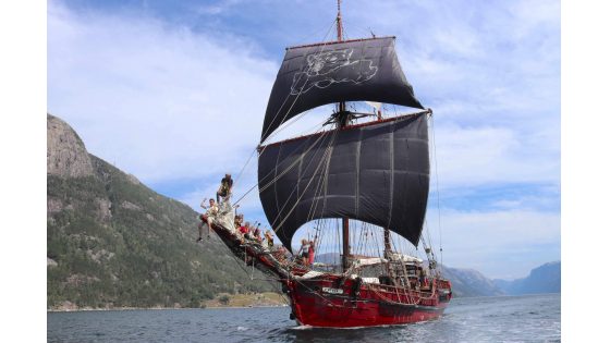 ATYLA Black sails and crew at norwegian fjord Low res.jpg